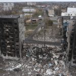 
              An heavily damaged apartment building following a Russian attack in the center of Borodyanka, Ukraine, Wednesday, April 6, 2022. Ukrainian authorities are poring over the grisly aftermath of alleged Russian atrocities around Kyiv, as both sides prepare for an all-out push by Moscow's forces to seize Ukraine’s industrial east. (AP Photo/Efrem Lukatsky)
            