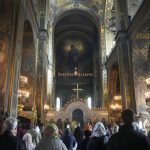 
              People attend a service at the Volodymysky Cathedral during Easter celebration in Kyiv, Ukraine, Sunday, Apr. 24, 2022. (AP Photo/Efrem Lukatsky)
            