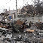 
              A destroyed Russian military vehicle in a Bucha street, close to Kyiv, Ukraine, Tuesday, April 5, 2022. (AP Photo/Efrem Lukatsky)
            