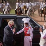 
              Indian Prime Minister Narendra Modi greets his British counterpart Boris Johnson upon the latter's arrival at the Indian presidential palace for his ceremonial reception in New Delhi, Friday, April 22, 2022. The meeting between the two on Friday is expected to focus on expanding economic and defense ties to wean India away from its dependence on Russia, officials said. (AP Photo/Manish Swarup)
            