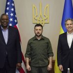 
              In this photo provided by the Ukrainian Presidential Press Office on Monday, April 25, 2022, from left; U.S. Secretary of Defense Lloyd Austin, Ukrainian President Volodymyr Zelenskyy and U.S. Secretary of State Antony Blinken pose for a picture during their meeting Sunday, April 24, 2022, in Kyiv, Ukraine. (Ukrainian Presidential Press Office via AP)
            