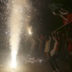 
              Supporters of Pakistani opposition party hold fireworks to celebrate following the Supreme Court decision, in Karachi, Pakistan, Thursday, April 7, 2022. Pakistan's Supreme Court on Thursday blocked Prime Minister Imran Khan's bid to stay in power, ruling that his move to dissolve Parliament and call early elections was illegal. That set the stage for a no-confidence vote by opposition lawmakers, who say they have enough support to oust him. (AP Photo/Fareed Khan)
            