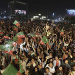 
              Supporters of ousted Pakistani Prime Minister Imran Khan party take part in a rally in Lahore, Pakistan, Sunday, April 10, 2022. Pakistan’s political opposition toppled Prime Minister Imran Khan in a no-confidence vote in Parliament after several political allies and a key party in his ruling coalition deserted him. (AP Photo/K.M. Chaudary)
            