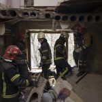 
              Firefighters work to secure a residential building previously damaged by a Russian attack in Kharkiv, Ukraine, Saturday, April 9, 2022. (AP Photo/Felipe Dana)
            