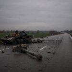
              A destroyed self propelled artillery unit is seen on a road near Kharkiv, Ukraine, Tuesday, April 12, 2022. (AP Photo/Felipe Dana)
            