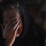 
              Liudmila Sumanchuk the grandmother of Veronika Kuts cries during her funeral ceremony in L'giv village, Chernihiv region, Ukraine, Friday April 8, 2022. Veronika Kuts, who was 12-year-old was killed during a Russian bombardment. (AP Photo/Evgeniy Maloletka)
            
