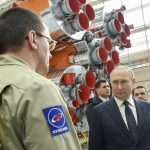 
              Russian President Vladimir Putin speaks with Roscosmos space agency employees at a rocket assembly factory during his visit to the Vostochny cosmodrome outside the city of Tsiolkovsky, about 200 kilometers (125 miles) from the city of Blagoveshchensk in the far eastern Amur region Tsiolkovsky , Russia, Tuesday, April 12, 2022. Russia on Tuesday marks the 61th anniversary of Gagarin's pioneering mission on April 12 1961, the first human flight to orbit that opened the space era. (Evgeny Biyatov, Sputnik, Kremlin Pool Photo via AP)
            