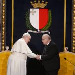 
              Pope Francis, left, is greeted by Malta's President George William Vella in the Grand Council Chamber of the Grand Mater's Palace in Valletta, Malta, Saturday, April 2, 2022. Pope Francis headed to the Mediterranean island nation of Malta on Saturday for a pandemic-delayed weekend visit, aiming to draw attention to Europe's migration challenge that has only become more stark with Russia's invasion of Ukraine. (AP Photo/Andrew Medichini)
            