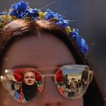
              People attend a pro-Ukrainian protest under the slogan "March for true Peace in Ukraine", in Berlin, Germany, Saturday, April 16, 2022. (AP Photo/Hannibal Hanschke)
            