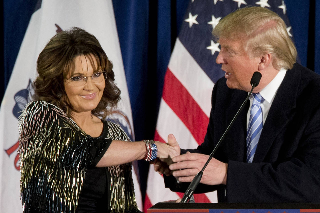 FILE - Former Alaska Gov. Sarah Palin, left, appears with then-Republican presidential candidate Do...