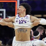 
              Kansas forward Jalen Wilson celebrates after their win against North Carolina in a college basketball game at the finals of the Men's Final Four NCAA tournament, Monday, April 4, 2022, in New Orleans. (AP Photo/Brynn Anderson)
            