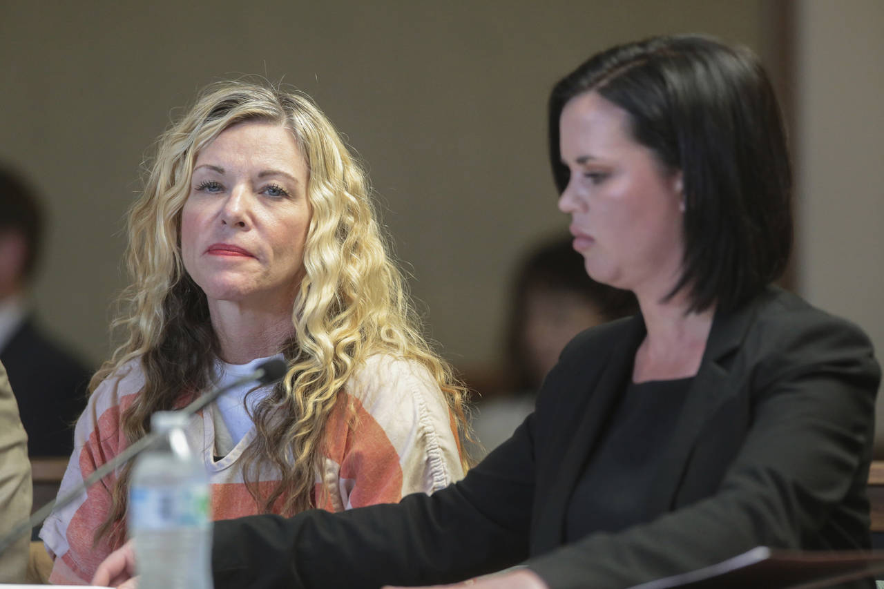 FILE - Lori Vallow Daybell glances at the camera during her hearing on March 6, 2020, in Rexburg, I...