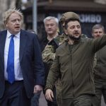 
              In this image provided by the Ukrainian Presidential Press Office, Ukrainian President Volodymyr Zelenskyy, right, and Britain's Prime Minister Boris Johnson, left, walk during their meeting in downtown Kyiv, Ukraine, Saturday, April 9, 2022. (Ukrainian Presidential Press Office via AP)
            