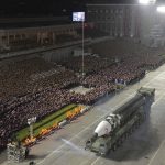 
              This photo provided by the North Korean government, shows what it says newly built intercontinental ballistic missile, the Hwasong-17 during a military parade to mark the 90th anniversary of North Korea's army at the Kim Il Sung Square in Pyongyang, North Korea Monday, April 25, 2022. Independent journalists were not given access to cover the event depicted in this image distributed by the North Korean government. The content of this image is as provided and cannot be independently verified. Korean language watermark on image as provided by source reads: "KCNA" which is the abbreviation for Korean Central News Agency. (Korean Central News Agency/Korea News Service via AP)
            