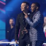 Hosts Kane Brown, left, and Anthony Mackie appear onstage at the CMT Music Awards on Monday, April 11, 2022, at the Municipal Auditorium in Nashville, Tenn. (AP Photo/Mark Humphrey)
