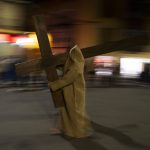 
              Penitents known as ''Ensacado'' from the "Silencio del Santisimo Cristo del Rebate" brotherhood take part in a Holy Week procession in Tarazona, northern Spain, Tuesday, April 12, 2022. (AP Photo/Alvaro Barrientos)
            