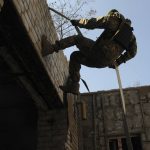 
              A Ukrainian serviceman attends a training session on Kharkiv outskirts, Ukraine, Thursday, April 7, 2022. (AP Photo/Andrew Marienko)
            