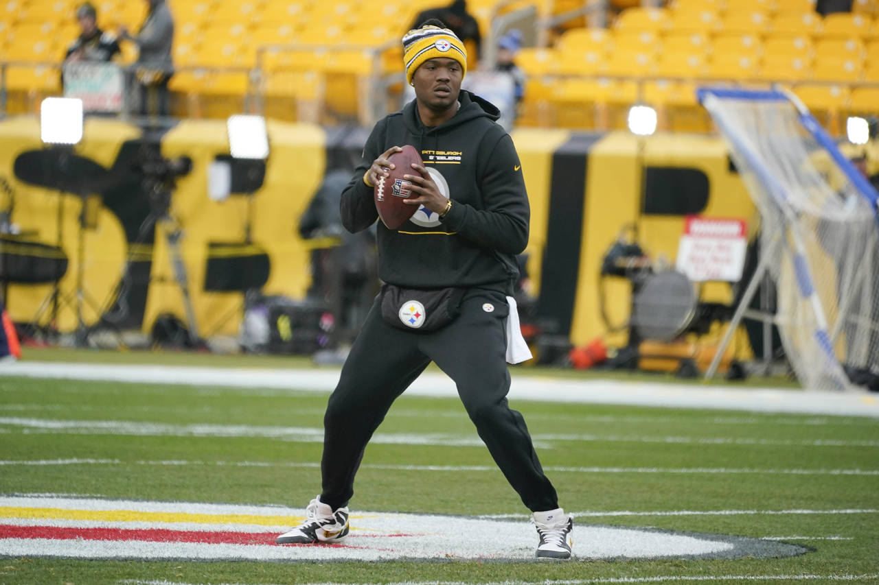 FILE - Pittsburgh Steelers quarterback Dwayne Haskins (3) warms up before an NFL football game agai...