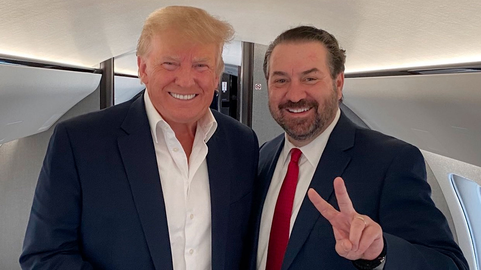 Former President Donald Trump, left, poses with Arizona Attorney General Mark Brnovich during Trump...