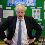 
              Britain's Prime Minister Boris Johnson visits the Field End Infant school, in South Ruislip, London, Friday May 6, 2022, following the local government elections. Britain’s governing Conservatives have suffered local election losses in their few London strongholds. Voting held Thursday for thousands of seats on more than 200 local councils decided who will oversee garbage collection and the filling of potholes, but were also seen as an important barometer of public opinion ahead of the next national election. (Daniel Leal/Pool via AP)
            