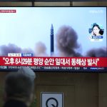 
              People watch a TV screen showing a news program reporting about North Korea's missile launch with file footage, at a train station in Seoul, South Korea, Thursday, May 12, 2022. South Korea says North Korea has fired a total of three short-range ballistic missiles toward the sea. South Korea's Joint Chiefs of Staff says the three missiles launched from the North's capital region on Thursday afternoon flew toward the waters off the country's eastern coast. (AP Photo/Lee Jin-man)
            