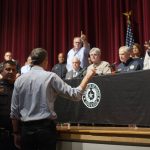 
              Democrat Beto O'Rourke, who is running against Greg Abbott for governor in 2022, interrupts a news conference headed by Texas Gov. Greg Abbott in Uvalde, Texas Wednesday, May 25, 2022. (AP Photo/Dario Lopez-Mills)
            