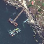 
              This satellite image provided by Maxar Technologies shows a closer view of barge, serna class landing craft and sunken serna craft near Snake Island in the Black Sea Thursday, May 12, 2022. (Satellite image ©2022 Maxar Technologies via AP)
            