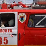 
              Children sit in a fire truck with letter Z, which has become a symbol of the Russian military, stuck on a window, during a city holiday in the city of Olonets, 300 km (186 miles) north-east of St. Petersburg, Russia, Sunday, May 1, 2022. (AP Photo)
            