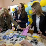 
              First Lady Jill Biden, second left, and Olena Zelenska, spouse of Ukrainian's President Volodymyr Zelenskyy, join a group of children at School 6 in making tissue-paper bears to give as Mother's Day gifts in Uzhhorod, Ukraine, Sunday, May 8, 2022. (AP Photo/Susan Walsh, Pool)
            