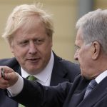 
              British Prime Minister Boris Johnson, left, listens to Finland's President Sauli Niinisto as they arrive at the Presidential Palace in Helsinki, Finland, Wednesday, May 11, 2022. Britain has signed a security assurance with Sweden which like its neighbor Finland is pondering whether to join NATO following Russia's invasion of Ukraine, pledging to "bolster military ties" in the event of a crisis and support both countries should they come under attack. (AP Photo/Frank Augstein, Pool)
            