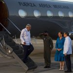 
              Mexican President Andres Manuel Obrador, left, is received by Cuban Foreign Minister Bruno Rodriguez, right, at the Jose Marti International Airport in Havana, Cuba, Saturday, May 7, 2022. (Yamil Lage/Pool Photo via AP)
            