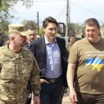 
              This image provided by the Irpin Mayor's Office shows Canadian Prime Minister Justin Trudeau walking with mayor Oleksandr Markushyn, right, in Irpin, Ukraine, Sunday, May 8, 2022. Trudeau made a surprise visit to Irpin on Sunday. The city was severely damaged during Russia’s attempt to take Kyiv at the start of the war. (Irpin Mayor's Office via AP)
            