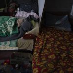 
              An elderly woman sleeps inside a basement used as a bomb shelter during Russian attacks in Severodonetsk, Luhansk region, Ukraine, Friday, May 13, 2022. (AP Photo/Leo Correa)
            