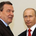 
              FILE- Russian Prime Minister Vladimir Putin, right, and former German chancellor Gerhard Schroeder during their meeting in St. Petersburg, Russia on April 4, 2009. Gerhard Schroeder left the German chancellery after a narrow election defeat in 2005 with an ambitious overhaul of the country’s welfare state beginning to kick in and every chance of becoming a respected elder statesman. Fast-forward to last week: German lawmakers agreed to shut down Schroeder’s taxpayer-funded office, the European Parliament called for him to be sanctioned, and his own party set a mid-June hearing on applications to have him expelled. Schroeder’s association with the Russian energy sector turned the 78-year-old into a political pariah in Germany after the invasion of Ukraine(AP Photo/Dmitry Lovetsky,file)
            