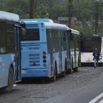 
              Buses wait for Ukrainian servicemen to transport them from Mariupol to a penal colony in Olyonivka after leaving Mariupol's besieged Azovstal steel plant, in Mariupol, in territory under the government of the Donetsk People's Republic, eastern Ukraine, Thursday, May 19, 2022. (AP Photo)
            