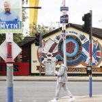 
              Election posters hang from lamp posts in the mainly Loyalist Newtownards road area of East Belfast, Northern Ireland, Monday, May 2, 2022, ahead of the May 5, 2022 local elections. (AP Photo/Peter Morrison)
            