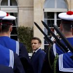 
              French President Emmanuel Macron reviews military troops during the ceremony of his inauguration for a second term at the Elysee palace, in Paris, France, Saturday, May 7, 2022. Macron was reelected for five years on April 24 in an election runoff that saw him won over far-right rival Marine Le Pen. (Gonzalo Fuentes/Pool via AP)
            