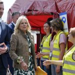 
              First lady Jill Biden talks with Slovakia's Prime Minister Eduard Heger as she visits with volunteers and first responders during a visit to Vysne Nemecke, Slovakia, near the border with Ukraine, Sunday, May 8, 2022. (AP Photo/Susan Walsh, Pool)
            