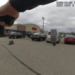 
              In this image taken from police body camera video released by the East Lansing Police,  DeAnthony VanAtten lays on the ground after being shot by East Lansing, Mich., police on April 25, 2022, while responding to a call about a shopper with a gun. Police released video of the incident Thursday, May 5, 2022. State police are investigating the shooting. DeAnthony VanAtten’s injuries were not life-threatening. (East Lansing Police via AP)
            