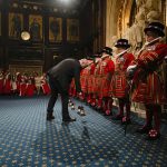 
              Yeomen Warders perform the ceremonial search of the Palace of Westminster prior to the State Opening of Parliament in London, Tuesday, May 10, 2022. Buckingham Palace said Queen Elizabeth II will not attend the opening of Parliament on Tuesday amid ongoing mobility issues. (AP Photo/Alastair Grant, Pool)
            