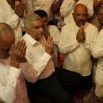 
              Sri Lanka's new prime minister Ranil Wickremesinghe, second left, takes part in religious observances at a temple in Colombo, Sri Lanka, Thursday, May 12, 2022. Five-time former Sri Lankan Prime Minister Ranil Wickremesinghe was reappointed Thursday in an effort to bring stability to the island nation, engulfed in a political and economic crisis.(AP Photo/Eranga Jayawardena)
            