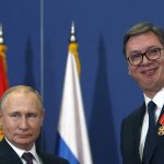 
              FILE- Russian President Vladimir Putin, left, poses with Serbian President Aleksandar Vucic after being awarded the Order of Alexander Nevsky in Belgrade, Serbia, Thursday, Jan. 17, 2019. Vucic said he has secured an "extremely favorable" gas deal with Russia during his telephone conversation with Vladimir Putin on Sunday, May 29, 2022. The Serbian populist president has announced that he has secured an “extremely favorable” gas deal with Russia. Serbian President Aleksandar Vucic, a former pro-Russian ultranationalist who claims he wants to take Serbia into the European Union, has refused to publicly condemn Russia's invasion of Ukraine. (AP Photo/Darko Vojinovic, File)
            