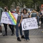 
              Amnet Ramos, 44, and her daughter, Inaia Hernandez, 12, stand for a portrait during a protest in Manhattan on Saturday, May 14, 2022, in New York where generations of women came together for a protest against the U.S. Supreme Court's anticipated ruling overturning Roe v. Wade. Ramos has protested since the Trump administration, and the threat to abortion rights has steeled her resolve to be heard - and that of her daughter. (AP Photo/Wong Maye-E)
            