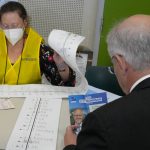 
              Australian Prime Minister Scott Morrison waits to cast his vote at a polling booth in his electorate of Cook in Sydney, Australia, Saturday, May 21, 2022. Australians go to the polls Saturday following a six-week election campaign that has focused on pandemic-fueled inflation, climate change and fears of a Chinese military outpost being established less than 1,200 miles off Australia's shore.(AP Photo/Mark Baker)
            