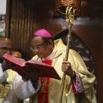 
              FILE - Anthony Poola, archbishop of Hyderabad, bends to kiss the gospel during Maundy Thursday service at St Joseph Cathedral Church in Hyderabad, India, Thursday, April 1, 2021. Pope Francis said Sunday, May 29, 2022 he has tapped 21 churchmen to become cardinals, most of them from continents other than Europe, which has dominated Catholic hierarchy for most of the church's history. (AP Photo/Mahesh Kumar A., File)
            