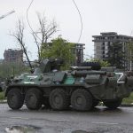 
              An APC of Donetsk People's Republic militia stands not far from Mariupol's besieged Azovstal steel plant, in Mariupol, in territory under the government of the Donetsk People's Republic, eastern Ukraine, Thursday, May 19, 2022. (AP Photo)
            
