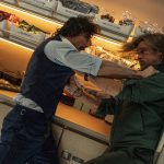 
              This image released by Sony Pictures shows Aaron Taylor-Johnson, left, and Brad Pitt in a scene from "Bullet Train." (Scott Garfield/Sony Pictures via AP)
            