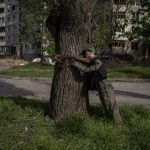 
              A mannequin dressed as a soldier is placed near a road in north Kharkiv, Ukraine, Friday, May 13, 2022. (AP Photo/Bernat Armangue)
            