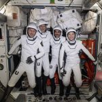 
              In this photo made available by NASA, four commercial crew astronauts, from left, European Space Agency astronaut Matthias Maurer and NASA astronauts Tom Marshburn, Raja Chari and Kayla Barron pose for a photo in their Dragon spacesuits during a fit check aboard the International Space Station's Harmony module on April 21, 2022. SpaceX brought the four astronauts home with a splashdown in the Gulf of Mexico early Friday, May 6, capping the busiest month yet for Elon Musk’s taxi service. (NASA via AP)
            
