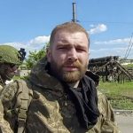 
              In this photo taken from video released by the Russian Defense Ministry on Saturday, May 21, 2022, Serhiy Volynskyy, nicknamed Volyna, commander of Ukraine's 36th Special Marine Brigade of Ukraine's Naval Forces lines up to be checked as he leaves the besieged Azovstal steel plant in Mariupol, in territory under the government of the Donetsk People's Republic, eastern Ukraine. (Russian Defense Ministry Press Service via AP)
            